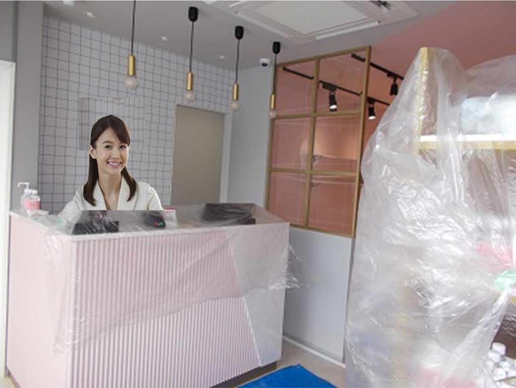 美容室の受付で、美しい女性が受付しています。